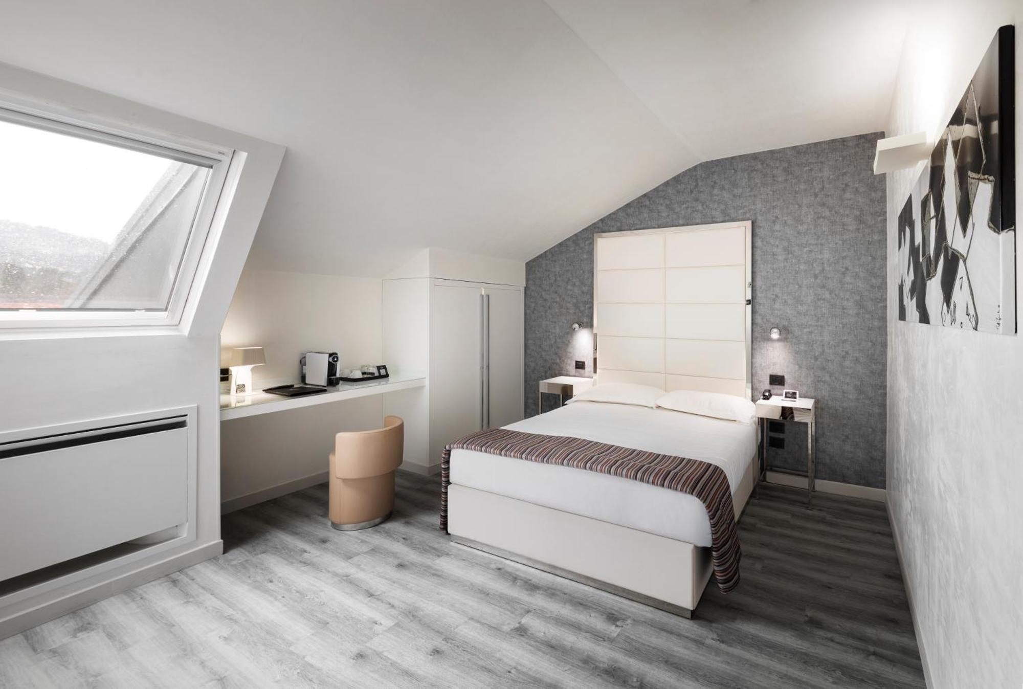 ホテル モンテカティーニ パレス モンテカティーニ・テルメ エクステリア 写真 A bedroom in the hotel